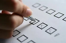 a person filling a questionnaire