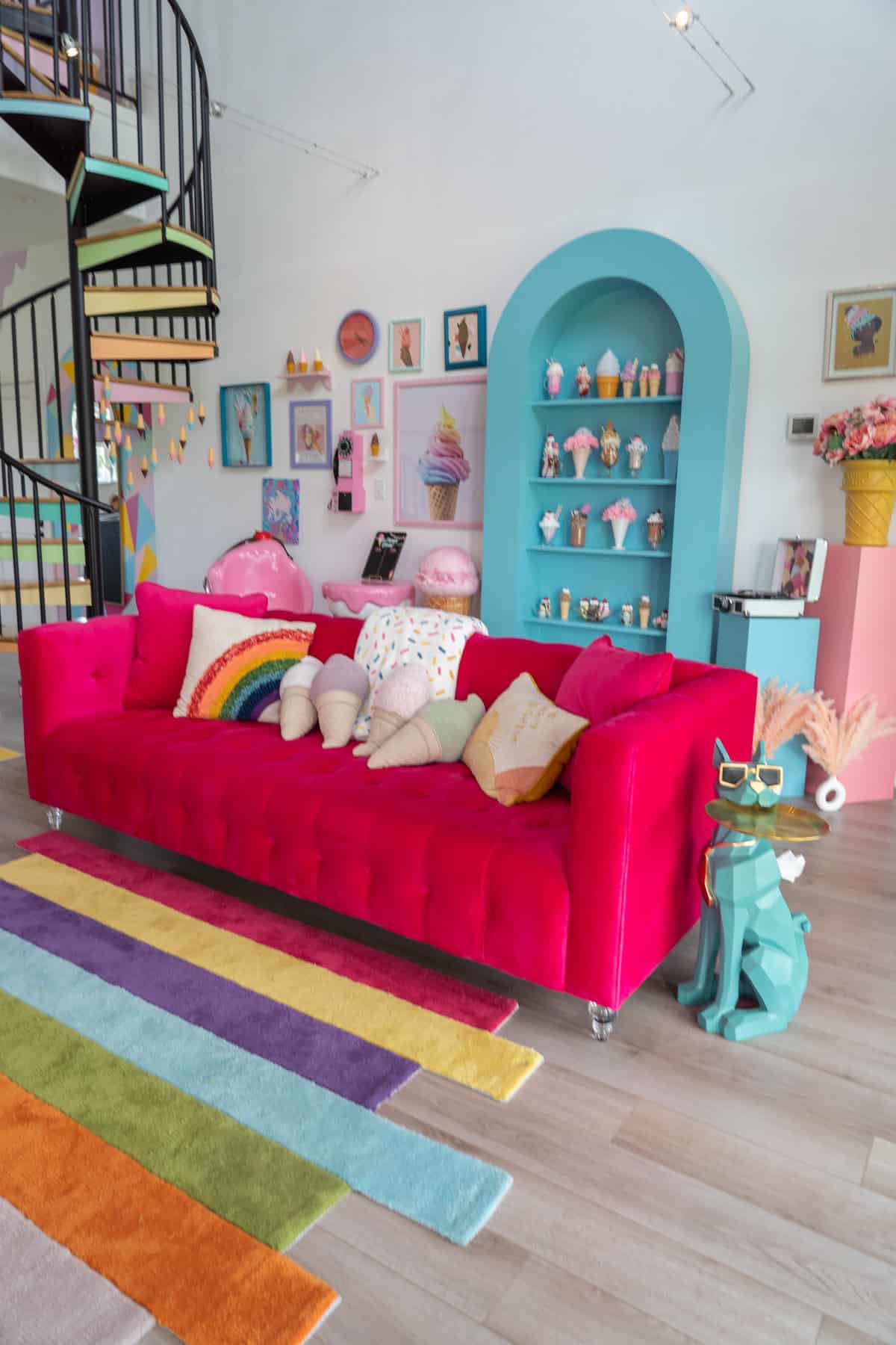 a pink couch with ice cream cones on it