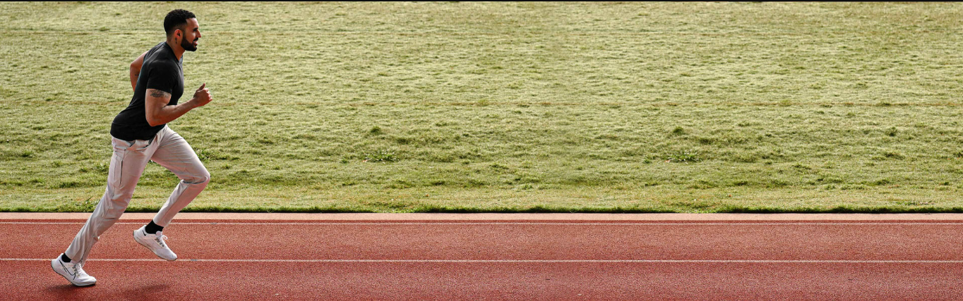 a running track with grass