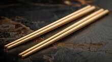 a pair of chopsticks on a table