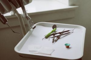 a close-up of a white tray with tools