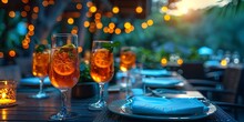 a table with glasses of drinks