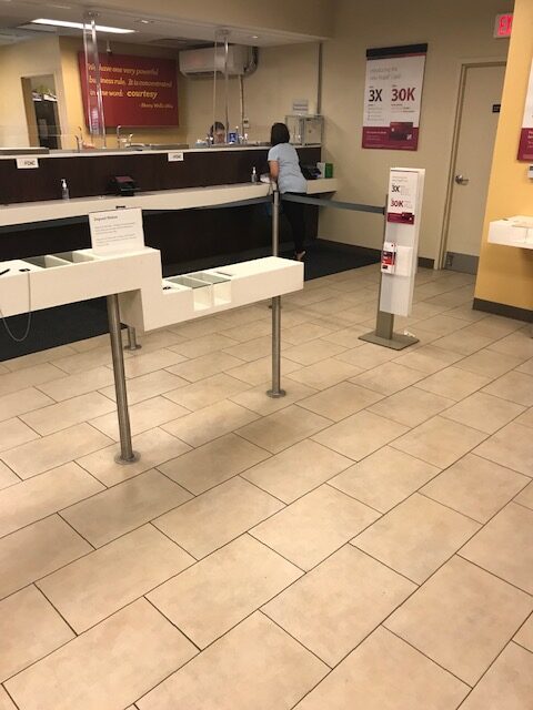 a woman standing at a counter