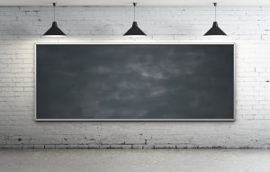 a chalkboard on a wall