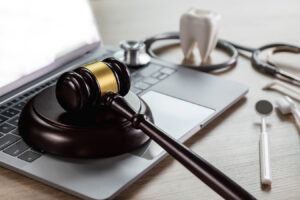 a gavel on a laptop