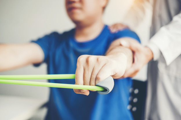 a person holding a rubber grip