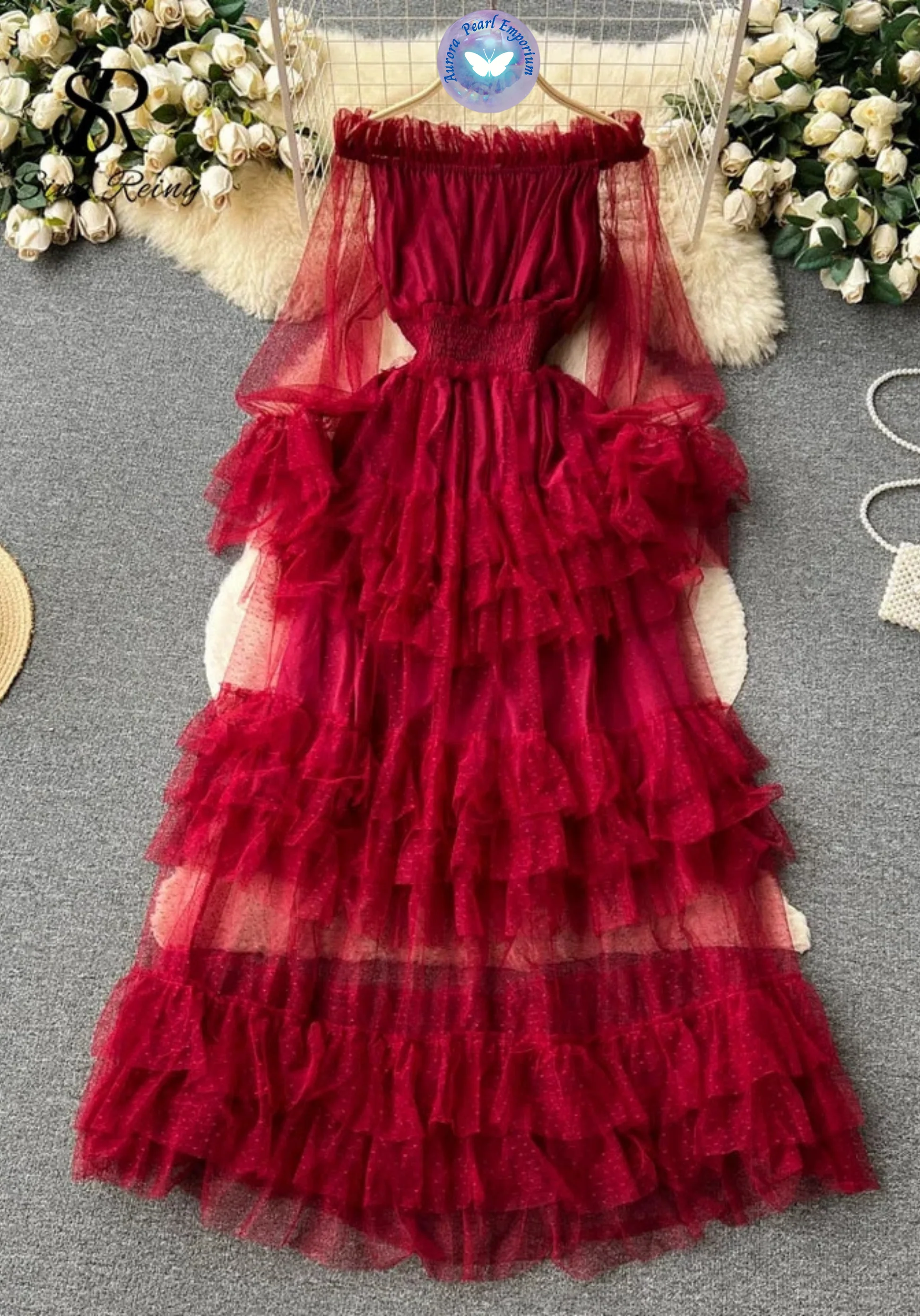 a red dress on a white fur rug
