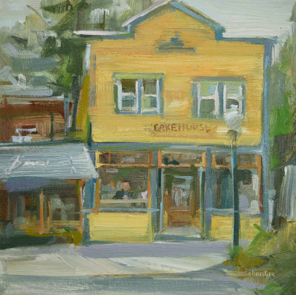 a painting of a yellow building