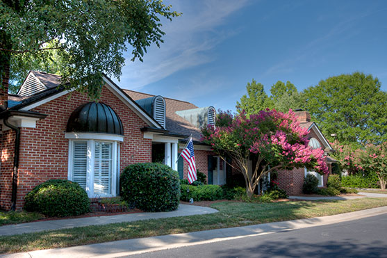 a house with a flag on the front