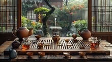 a table with teapots and cups on it