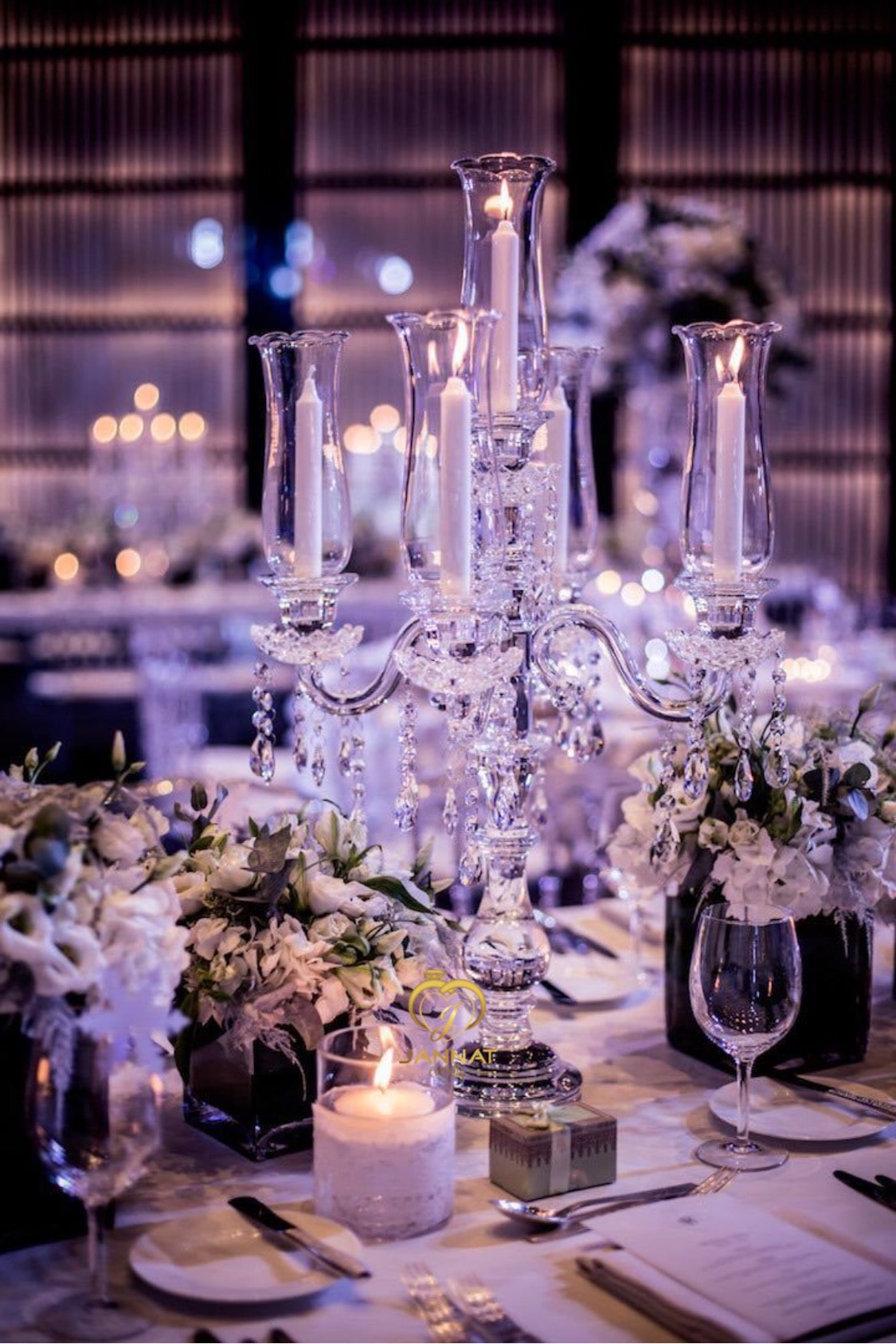 a crystal candelabra with candles on a table