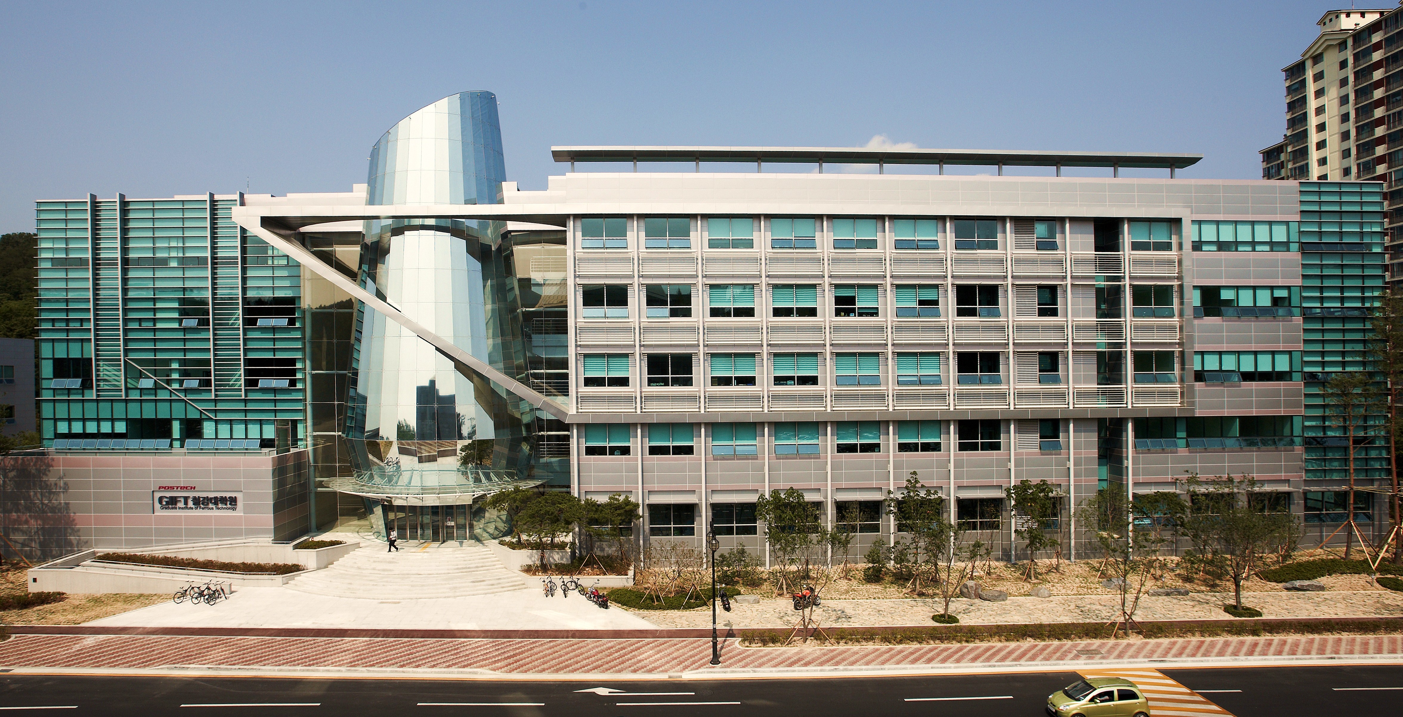 a building with a curved glass front