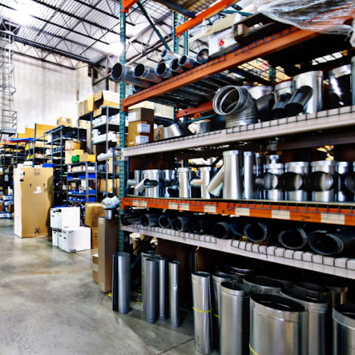 a warehouse with many metal pipes