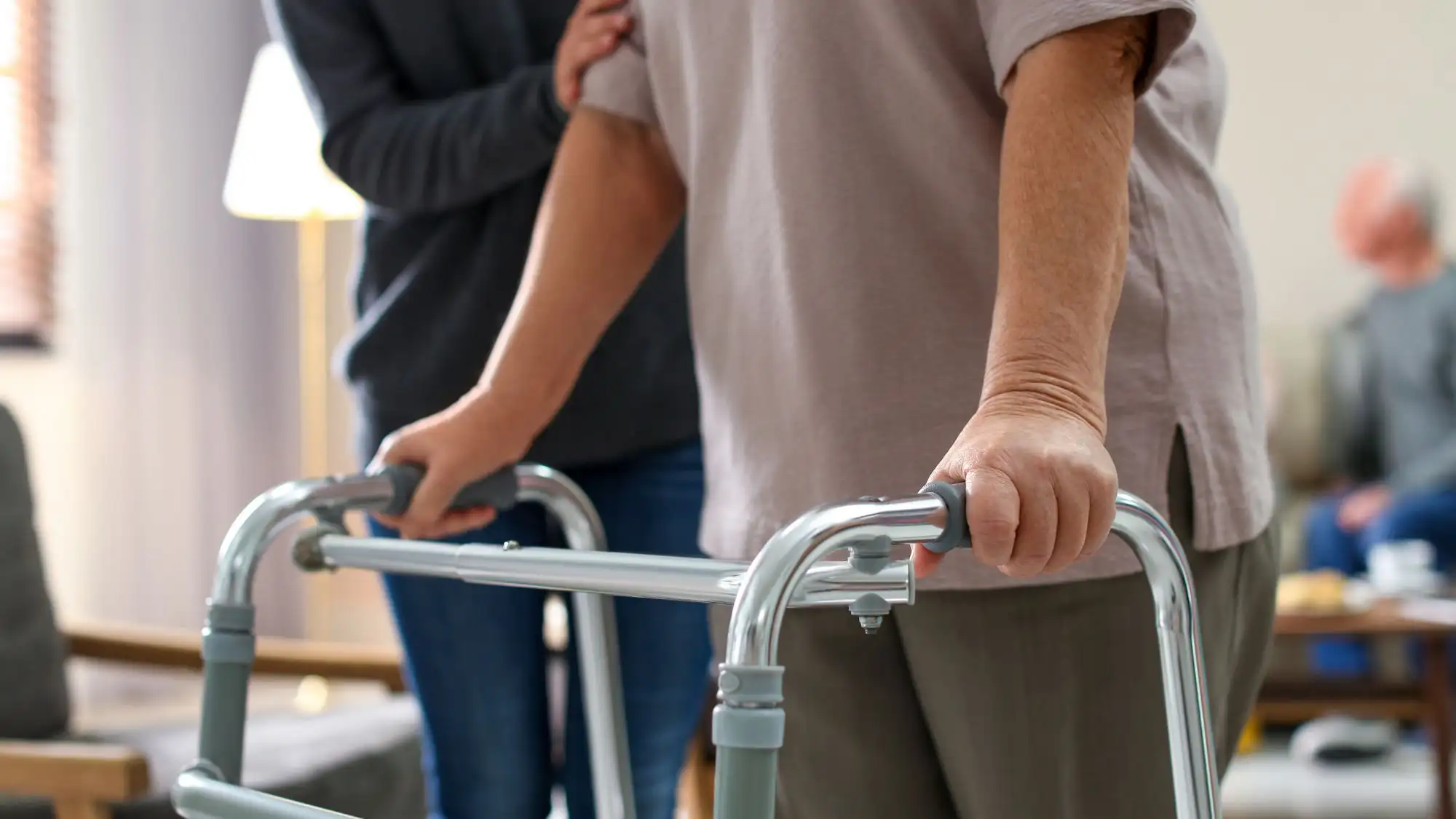 a person holding a walker