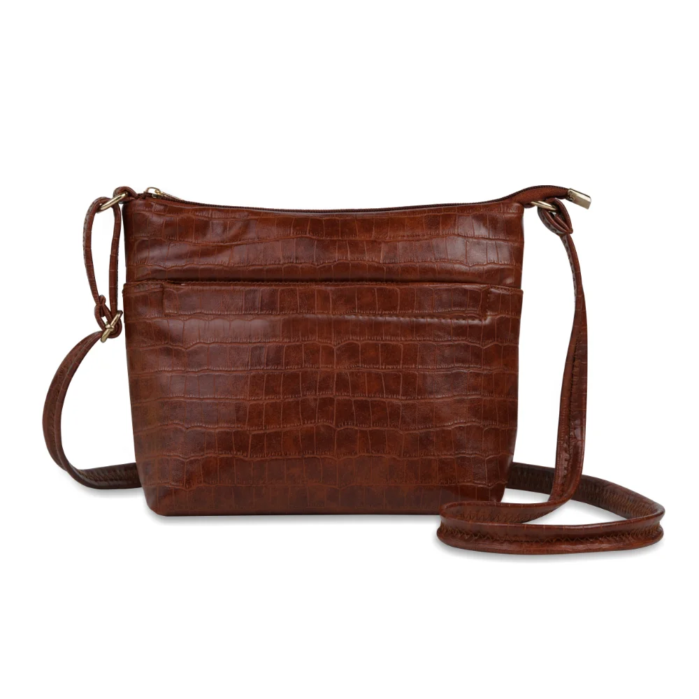 a brown leather purse with a strap