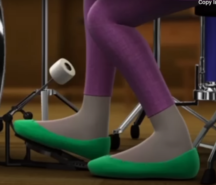 a person wearing purple tights and green shoes