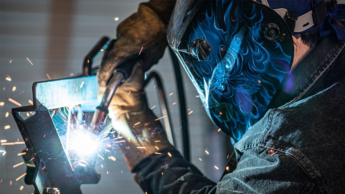 a person welding a metal object