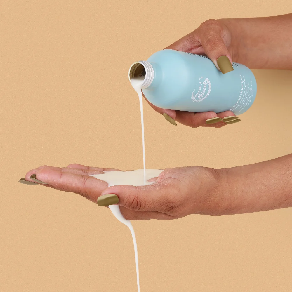 a person pouring milk into a hand