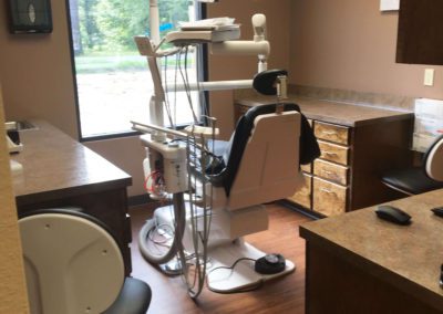 a dentist chair in a room