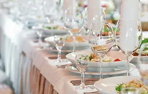 a table with plates and glasses
