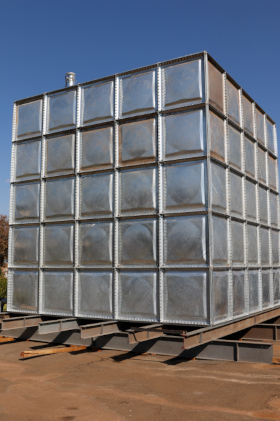 a large metal cube on a pallet