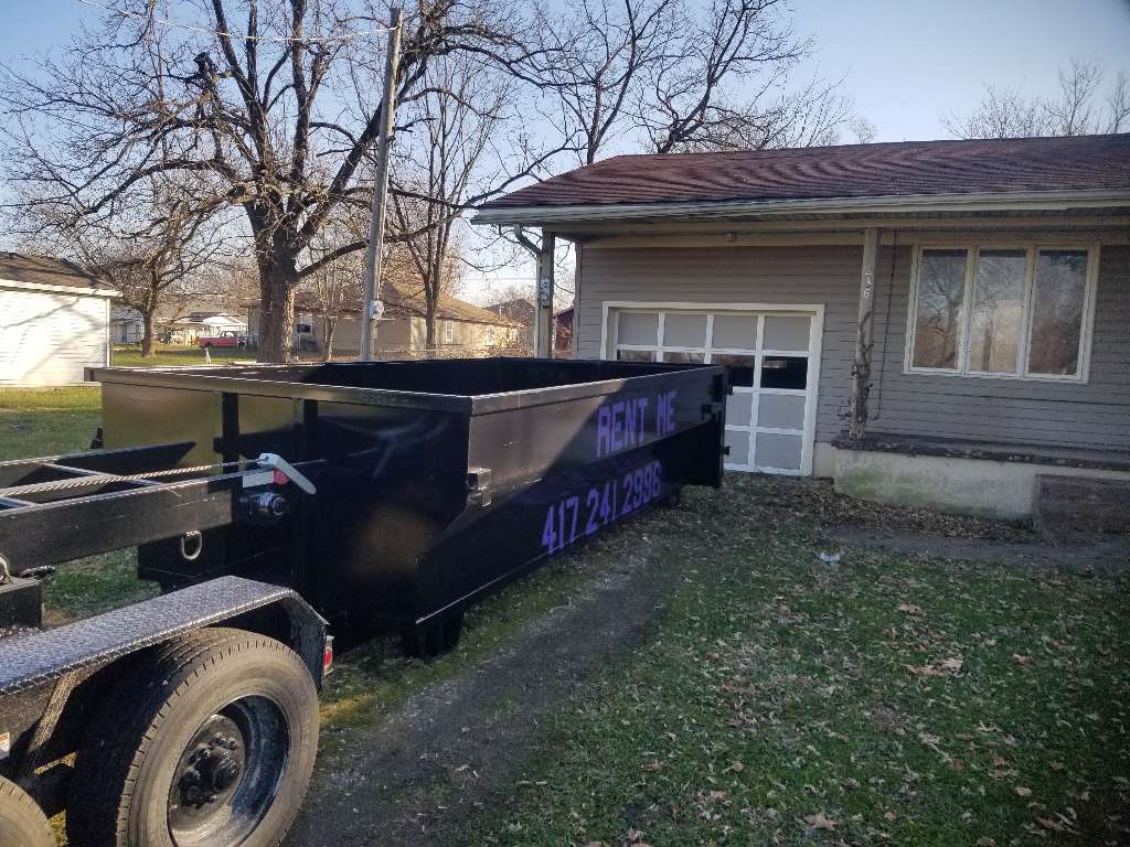 a trailer in front of a house