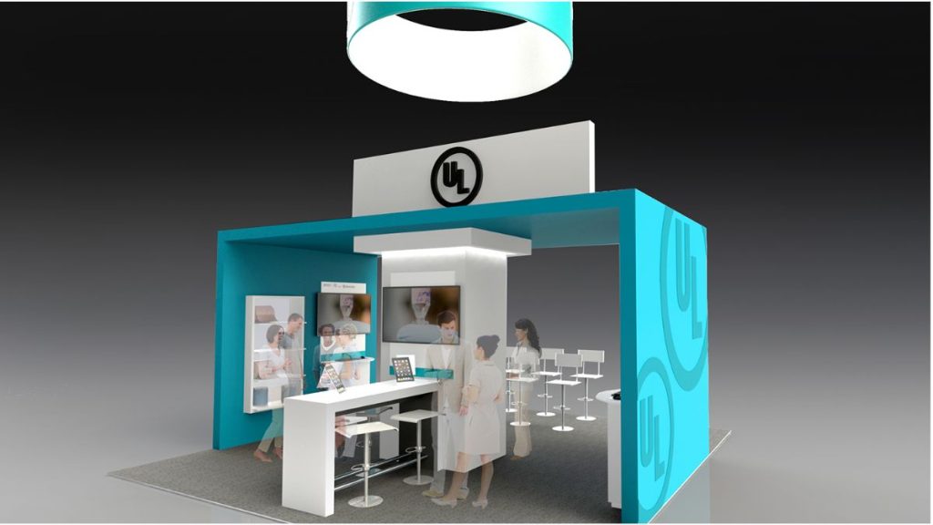 a booth with people standing around