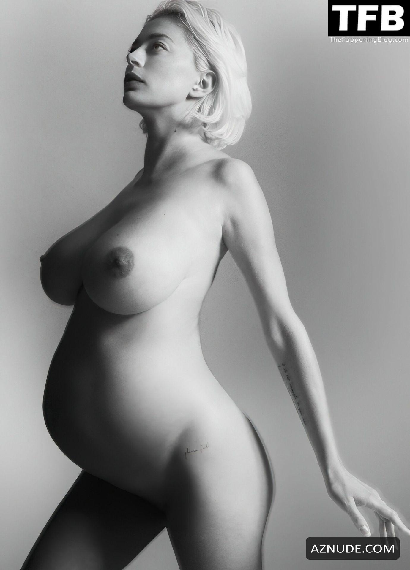 a pregnant woman with blonde hair