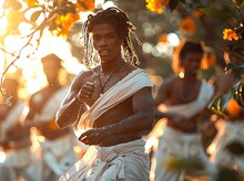 a group of men dancing in white robes