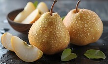 a pears with water drops on them