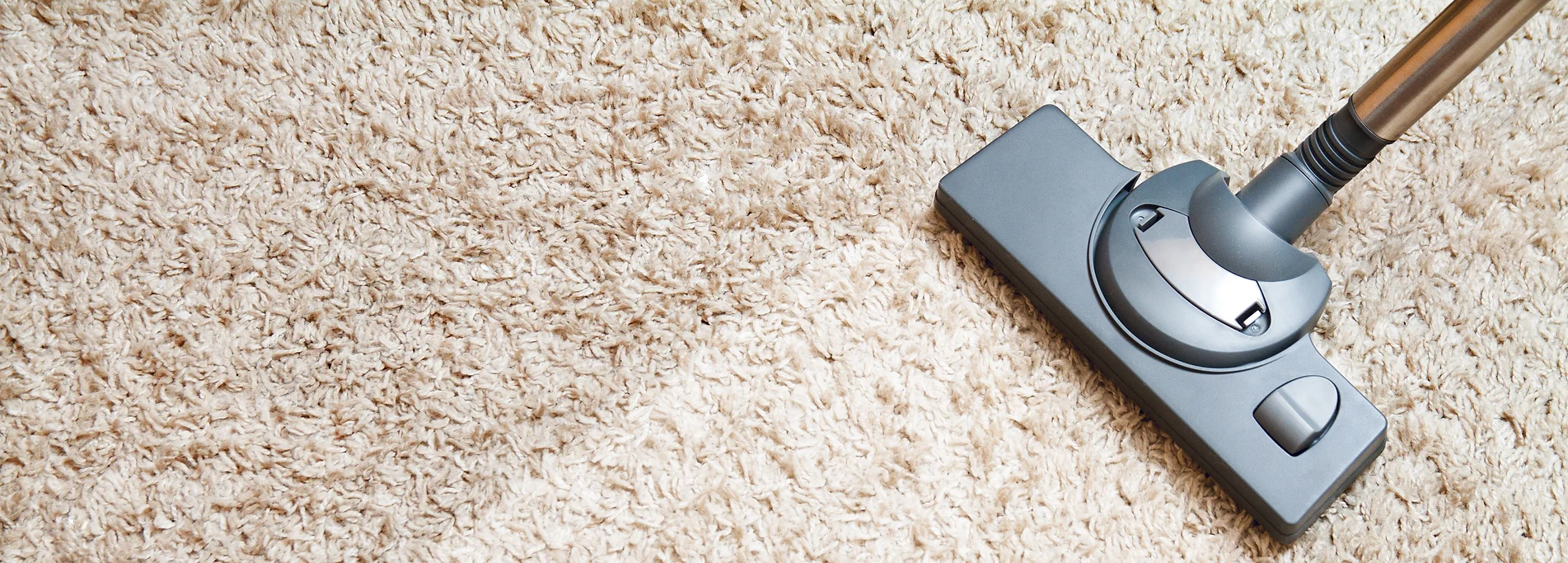 a black rectangular object on a carpet