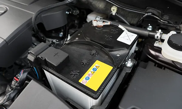 a car battery in the engine