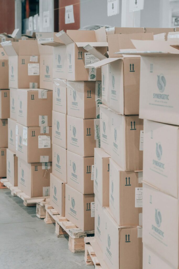 a group of boxes stacked on pallets