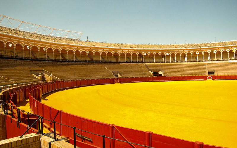 a large arena with a yellow arena