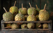 a pile of durian on a shelf