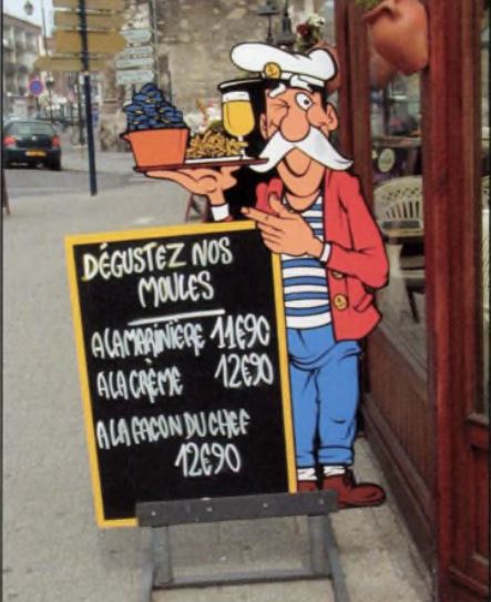 a sign with a cartoon character holding a plate of food