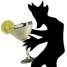 a silhouette of a person holding a glass of liquid