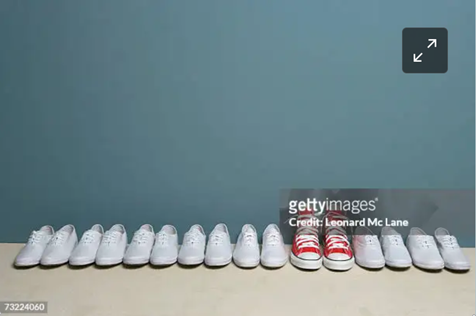 a row of white shoes