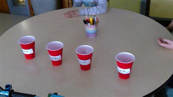 a group of red cups on a table