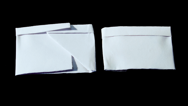 a close-up of a folded white paper