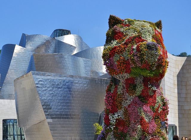 a statue of a dog made of flowers