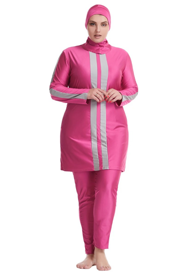a woman in a pink outfit