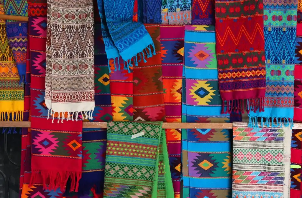a group of colorful scarves