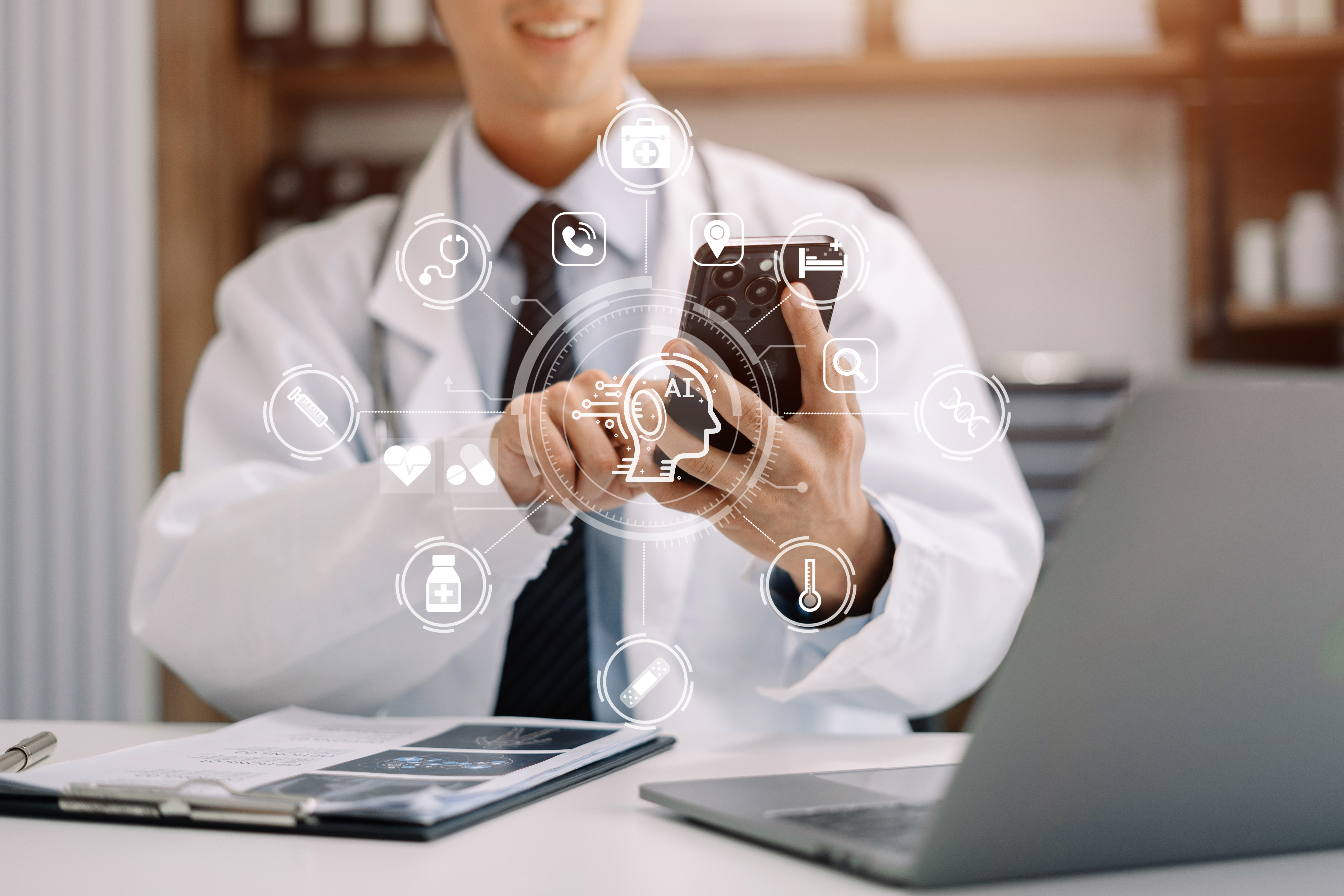 a man in a white coat using a phone