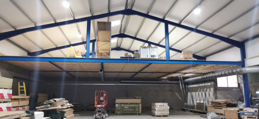 a warehouse with boxes and boxes on top