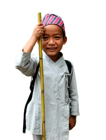 a boy holding a bamboo stick