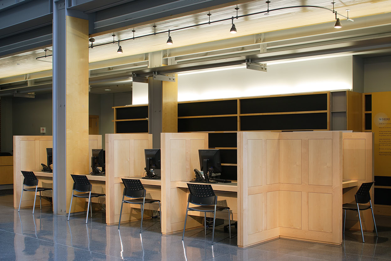 a row of computers in a room