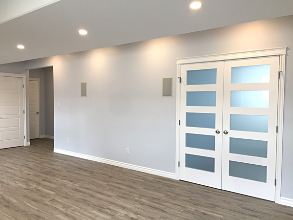 a white double doors in a room