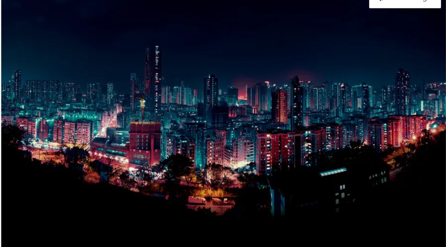 a city at night with many buildings