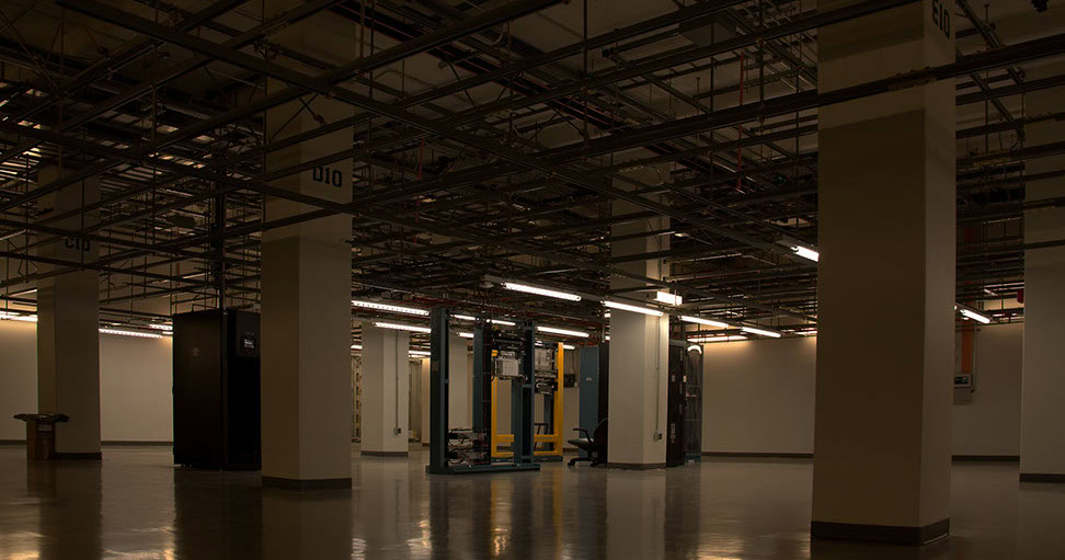 a large room with a large metal structure